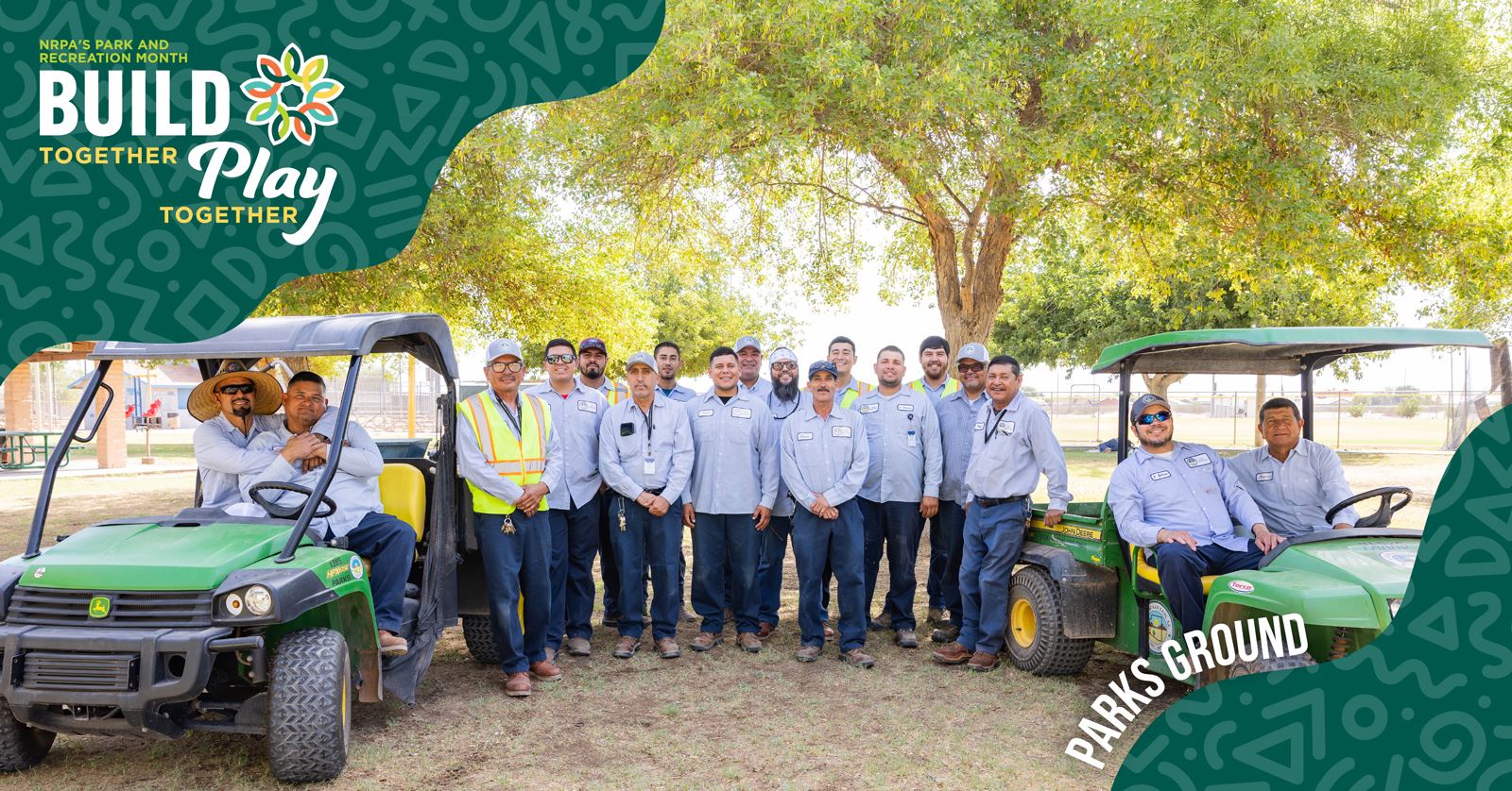 The Build for Play team stands proudly with their custom vehicles, showcasing their creativity and teamwork.